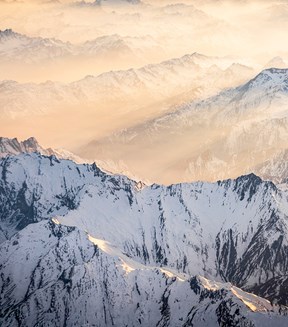 Sun shining on Swiss mountains