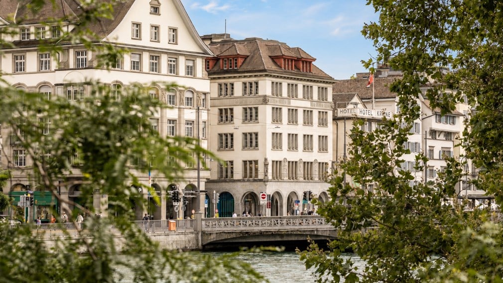City center of Zurich with bridge and river flowing through it