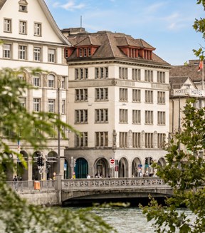 City center of Zurich with bridge and river flowing through it