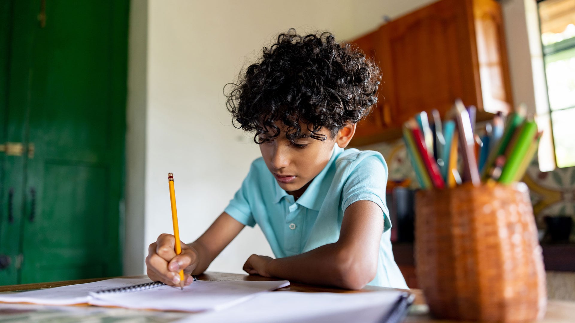 boy-drawing-at-desk.jpg