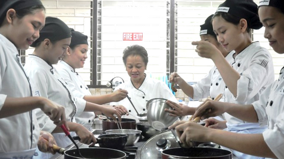 A female cooking class in the Philippines