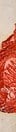 Close-up of a red wax seal against a neutral background.