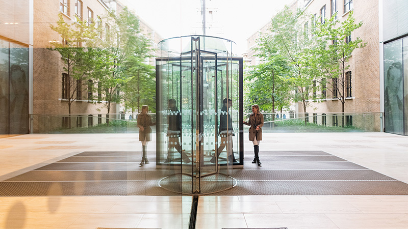 People walking past Rothschild & Co's main entrance