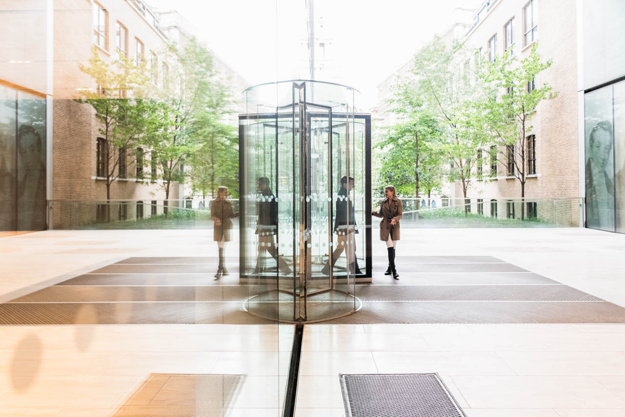 Two people exiting the office