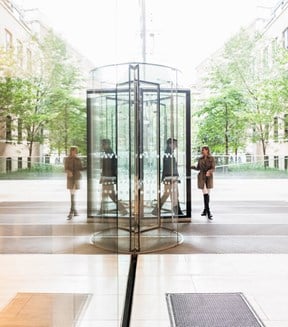 Two people exiting the office