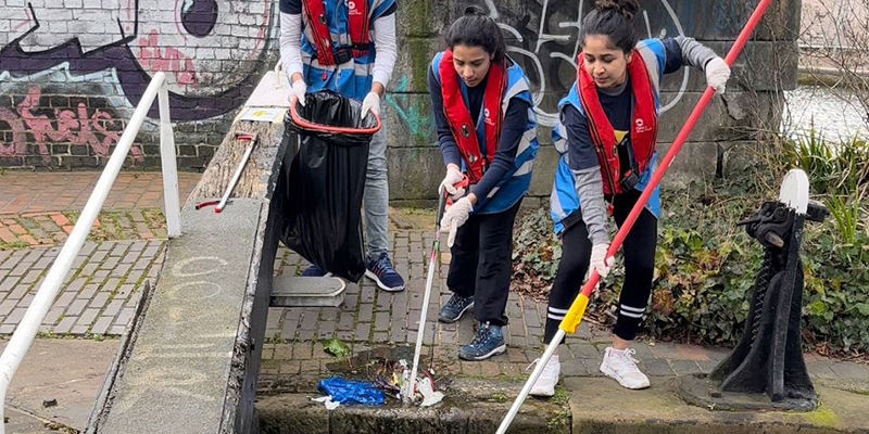 People cleaning river