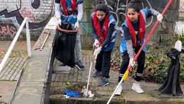 People cleaning river
