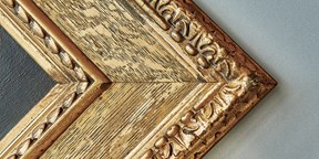 Gold picture frame at an angle