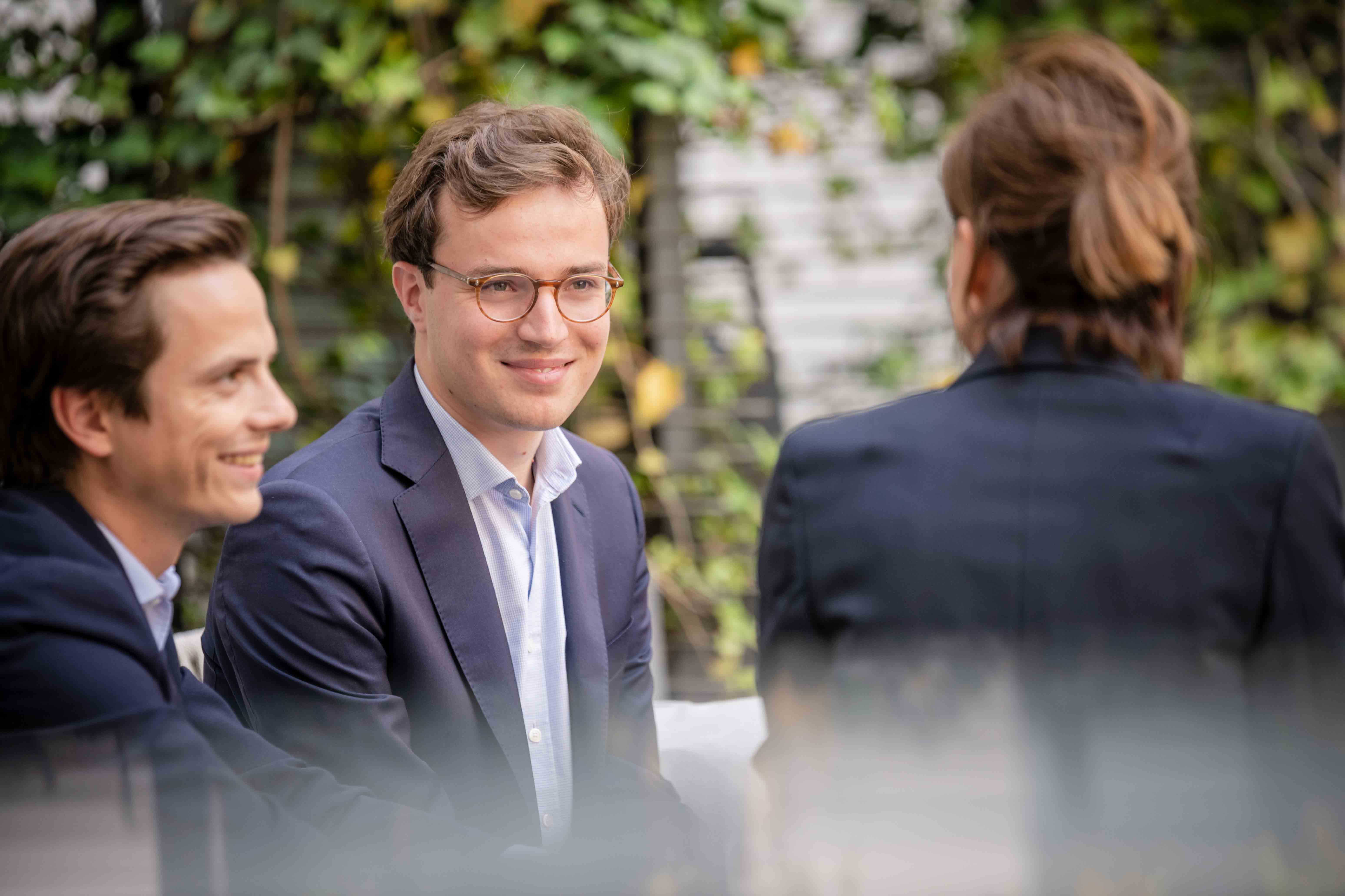 colleagues talking outside