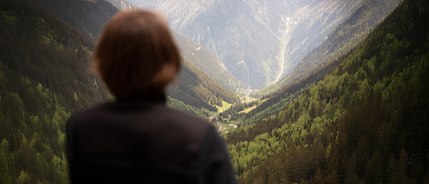 switzerland-valley-woman-wide.png