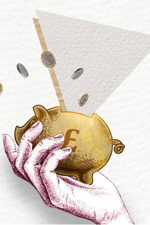 A hand holding a piggy bank with pound coins flying in.
