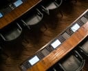 Above-head image of chairs in a boardroom