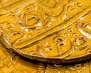Detail of a Moghal Empire Mohur gold coin dating from 1806, from a case of fifteen gold and silver coins collected from around the world to commemorate the ‘Waterloo’ commission undertaken by Nathan Mayer Rothschild (1777-1836) and his brothers. Nathan's London banking House, N M Rothschild, dealt in bullion and foreign exchange, and his business successes earned him the contract from the British Government to supply Wellington's troops with gold coin in 1814 and 1815, leading up to the Battle of Waterloo. To fulfil the contract, Nathan and his brothers successfully bought up gold bullion and coins from all over Europe and beyond.