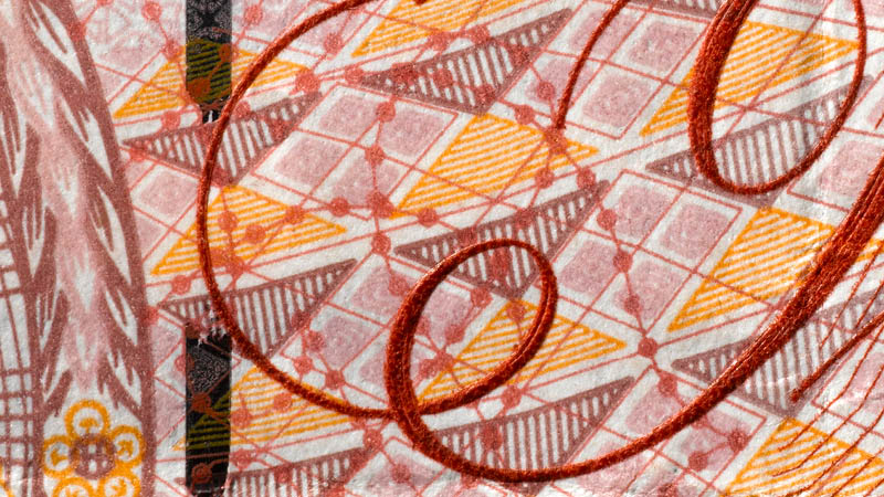 Zoomed in image of a pound note