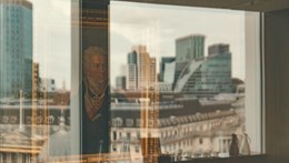 Image of the london skyline reflecting off of the Rothschild London office windows