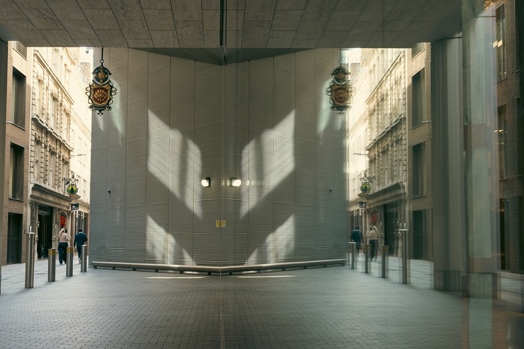 Image of the Rothschild & Co New Court office being reflected in the window