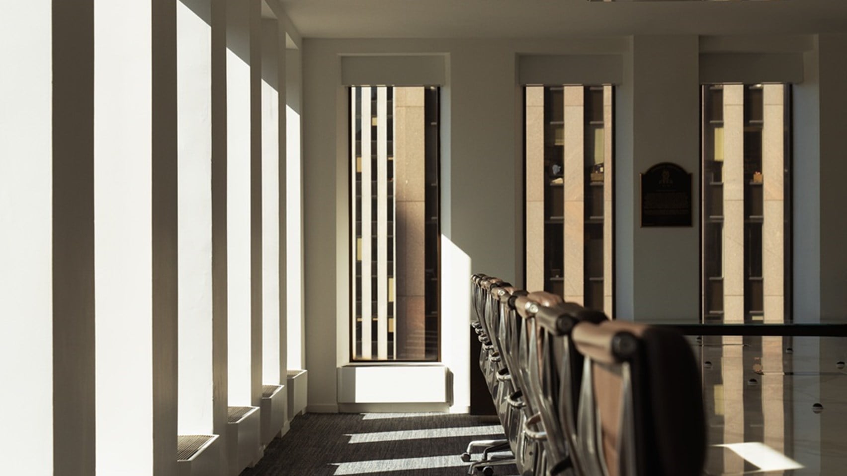 Zoomed in image of some chairs in a Rothschild office meeting room