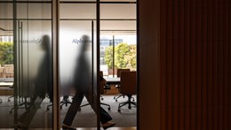 Image of someone walking through the Rothschild offices