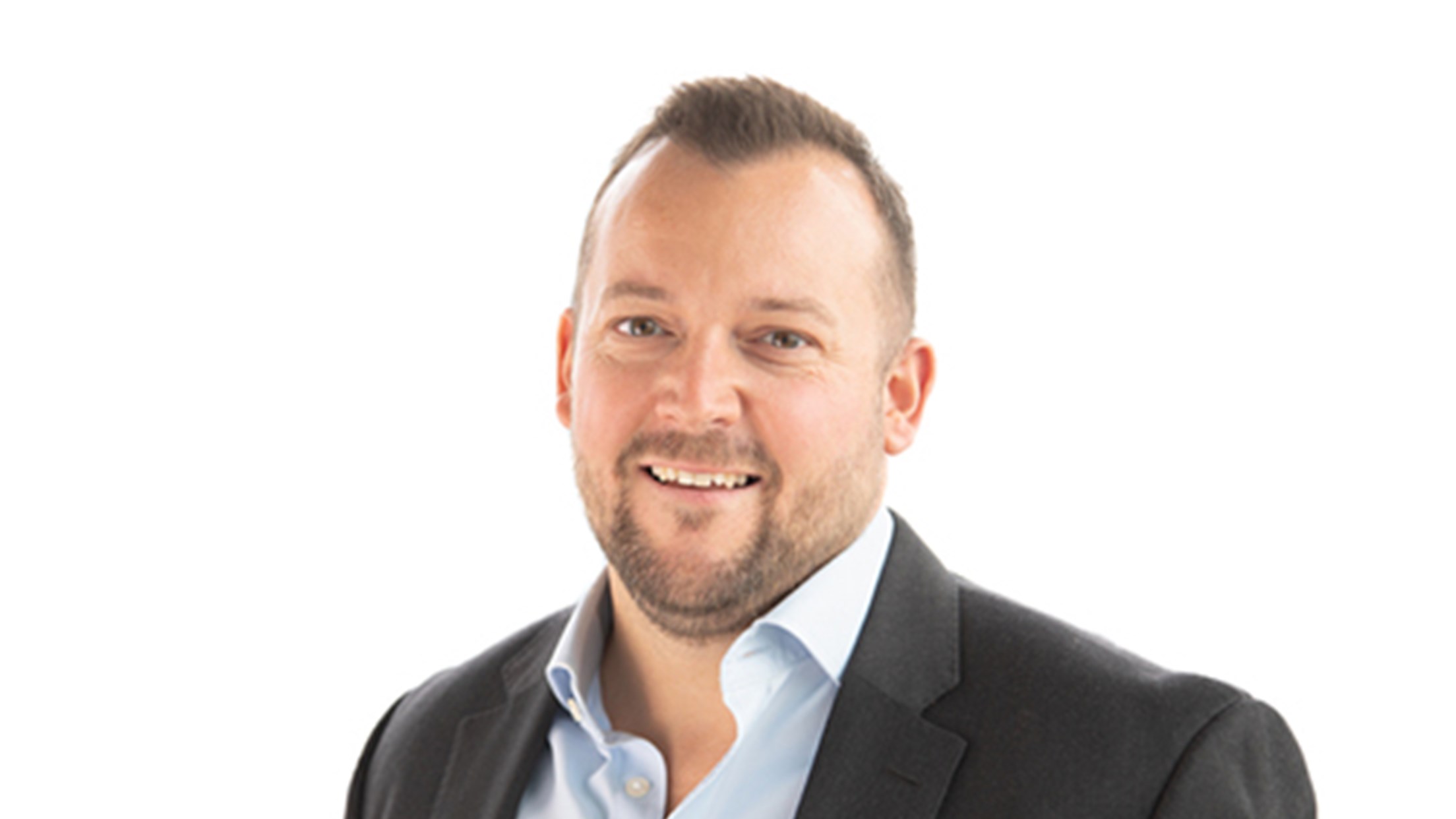 Headshot of Tim Brenton