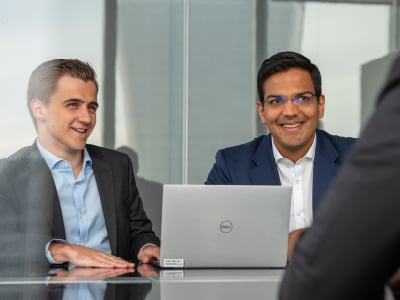 Image of people having a meeting at rothschild & co