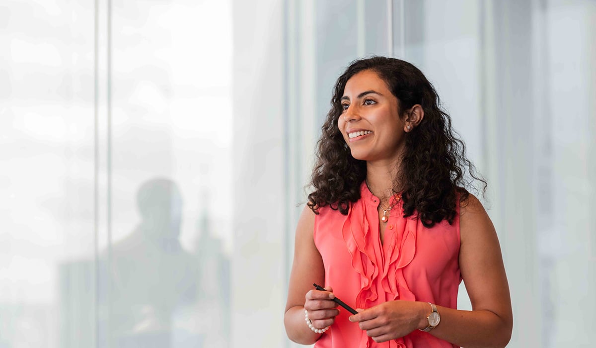 image of a woman presenting to a room