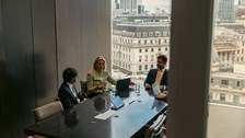 Image of three people having a consultation in an office at Rothschild & Co's New Court office