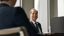 Picture of an individual in a meeting room at Rothschild & Co's London office, New Court