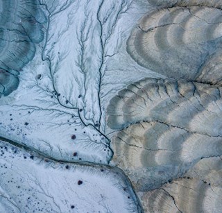 Birdseye shot of a river, sustainable investing header image