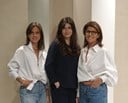 Three women standing