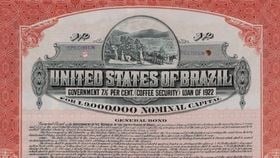 A printed red and black bond for the United States of Brazil with decorative illustrations around the border.