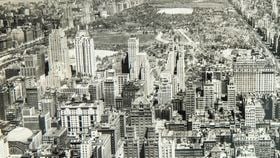 A black and white photograph of buildings in Manhattan, New York City, from the1940s.